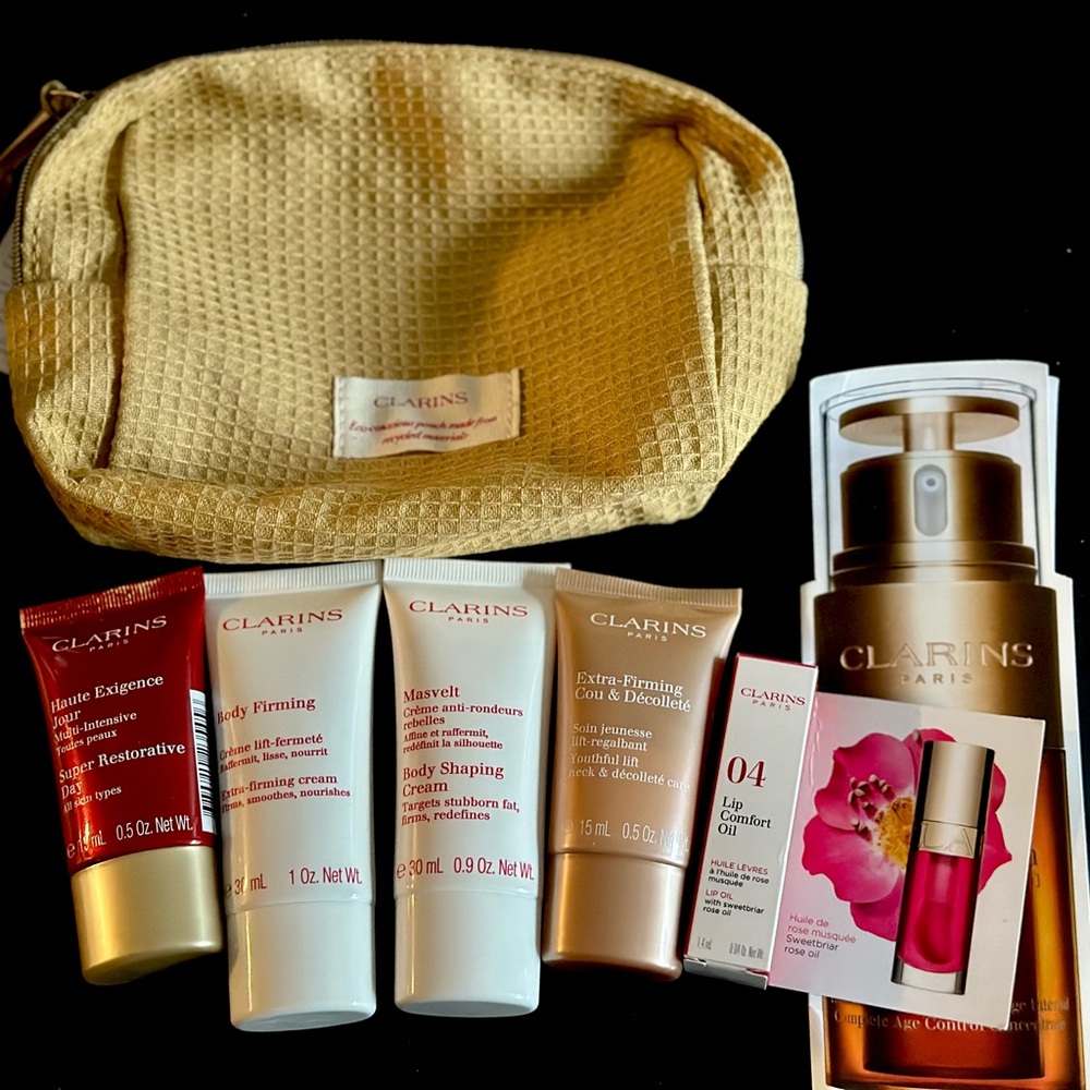 NEW 7pc Clarins Beauty Skincare Minis with makeup bag